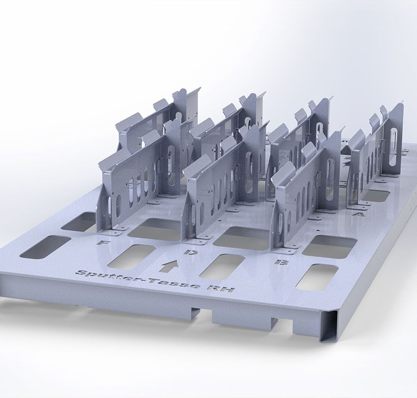 Eine spezifische Vorrichtung zum Bedampfen von Kunststoffteilen mit detaillierten Aussparungen